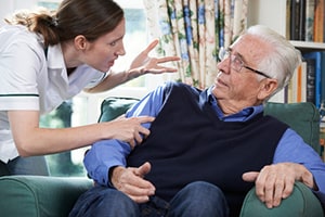 Nurse Yelling an Old Man